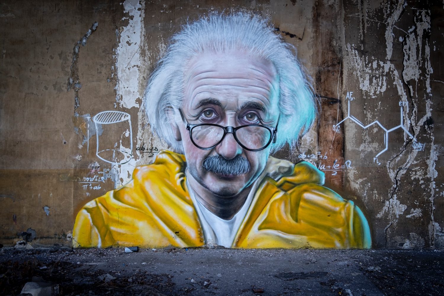 Photo by Taton Moïse man in yellow and blue hoodie wearing eyeglasses